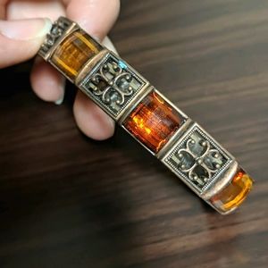 4 items  for $10. Elastic bronze bracelet